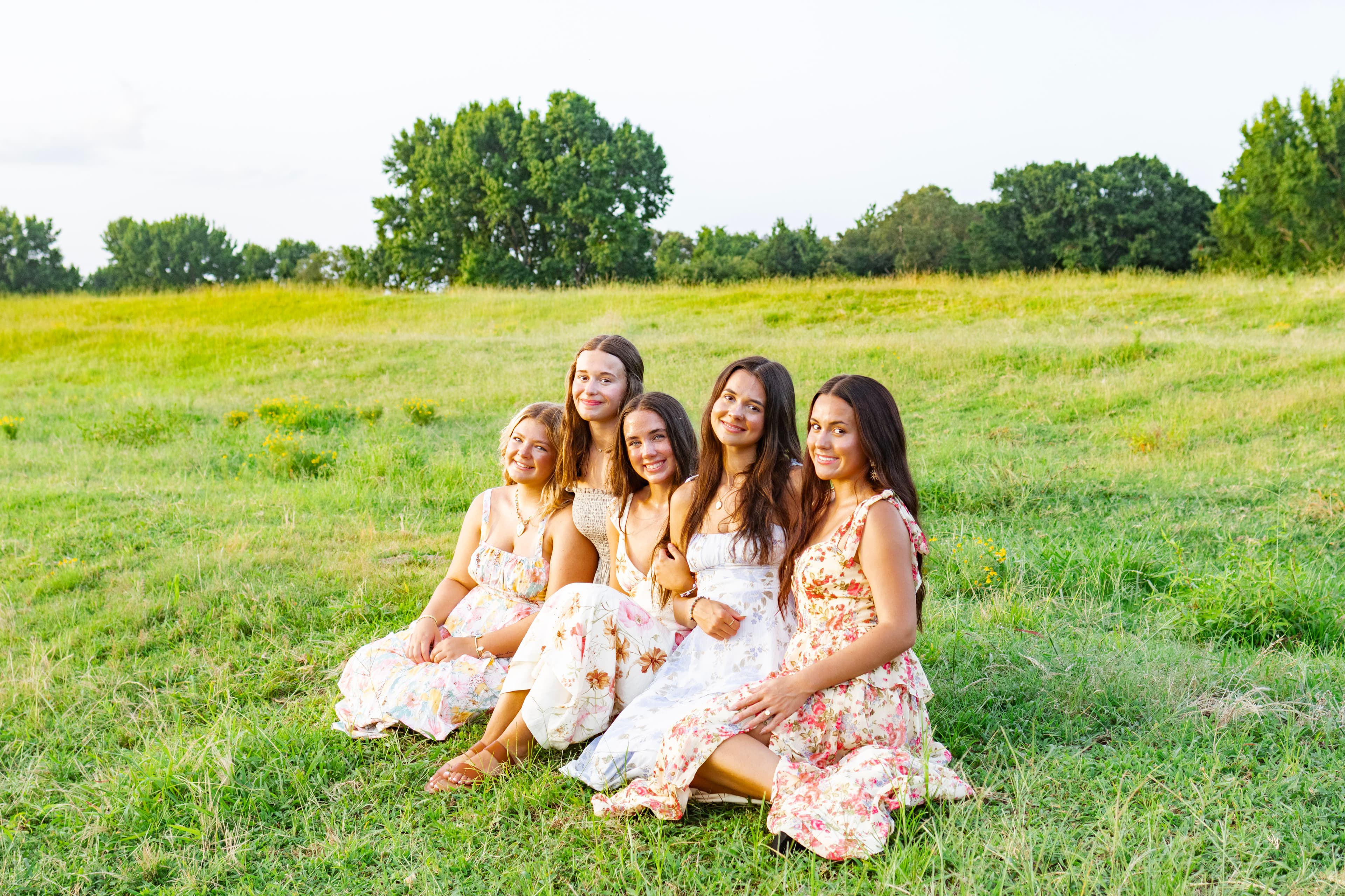 Outdoor group portrait with everyone gathered together in natural light
