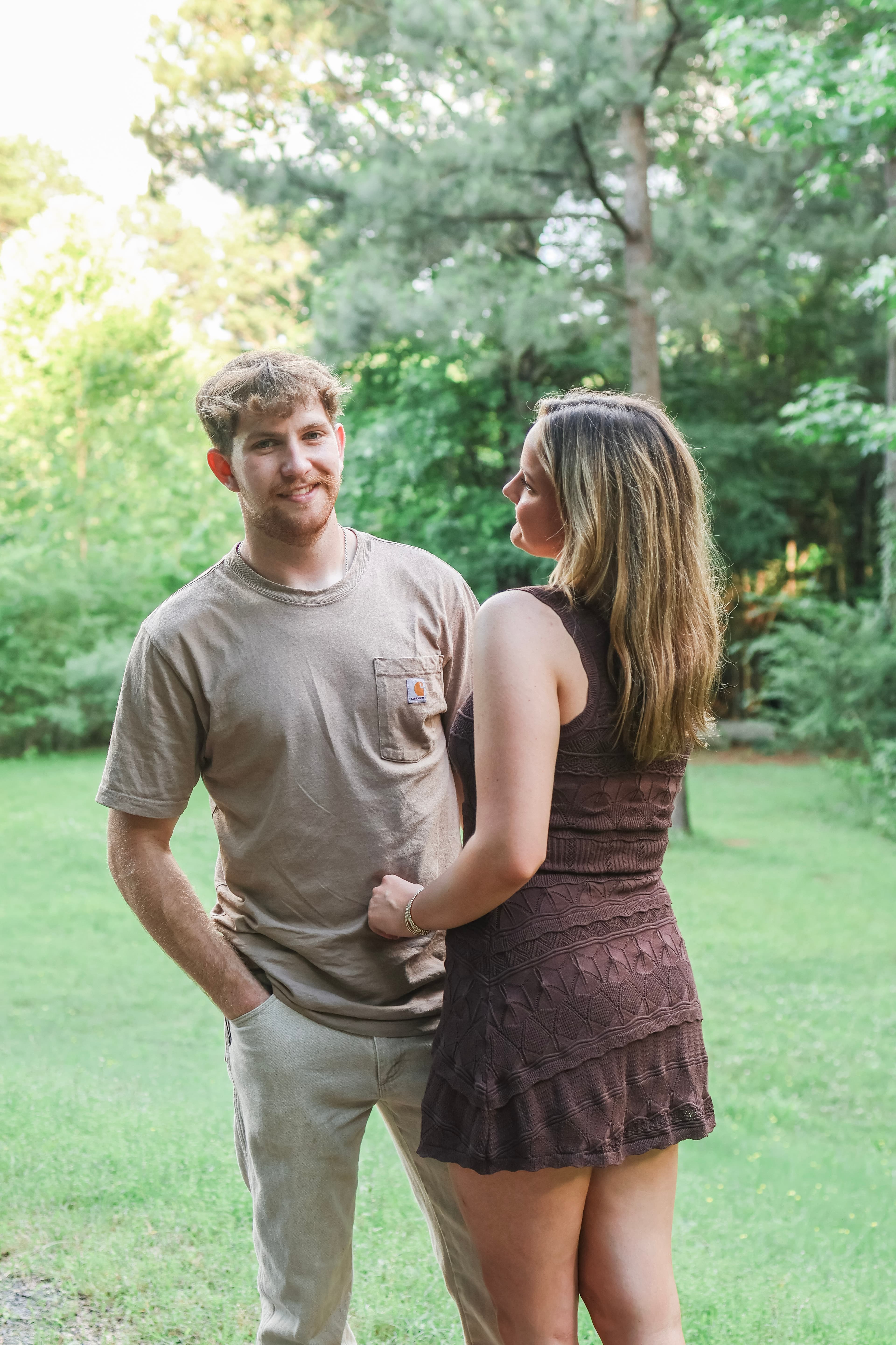 Couple portrait in a green outdoor setting